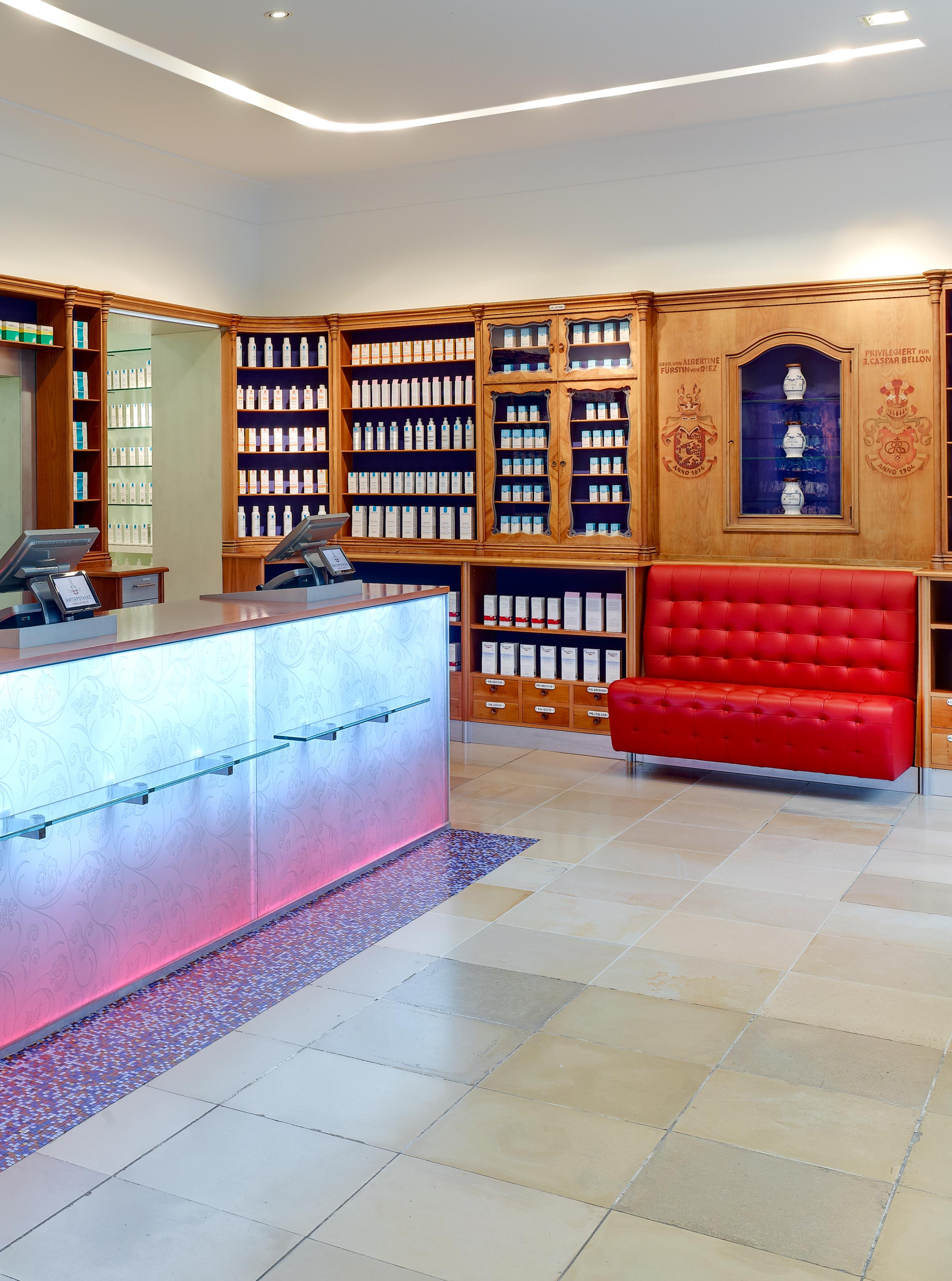 Shop window area with newly integrated self-service section in the historic pharmacy